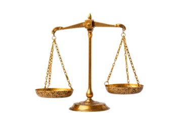 Antique gold balance scale with two empty pans against black background weighing