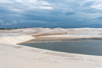 Dunes and lagoons of lagoa bonita, Lencois Maranhenses, Barreirinhas, Brazil. White sand dunes with pools of fresh water