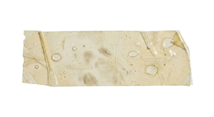 Stained torn paper strip with water marks
