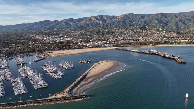 Santa Barbara residential aerial. Aerial views over Santa Barbara harbor. Santa Barbara drone panorama. California shoreline at Santa Barbara.