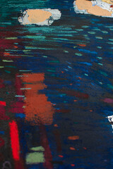 Abstract festive night background with fireworks-like strokes. Dark blue texture with red, gold and green accents. Handmade dry pastel artwork for holiday banners, posters, greeting cards.