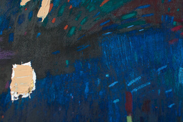 Abstract festive night background with fireworks-like strokes. Dark blue texture with red, gold and green accents. Handmade dry pastel artwork for holiday banners, posters, greeting cards.