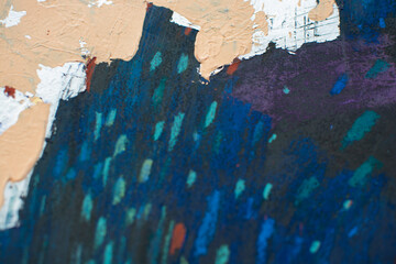 Abstract festive night background with fireworks-like strokes. Dark blue texture with red, gold and green accents. Handmade dry pastel artwork for holiday banners, posters, greeting cards.