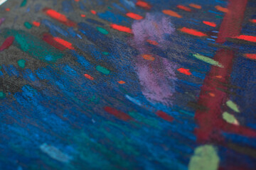 Abstract festive night background with fireworks-like strokes. Dark blue texture with red, gold and green accents. Handmade dry pastel artwork for holiday banners, posters, greeting cards.