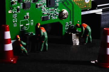 Critical maintenance, digital infrastructure engineering team miniature workers repairing electronics circuit board technology