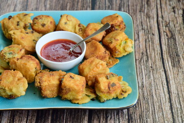 A traditional fried food from Indonesia made from tofu served with chili sauce