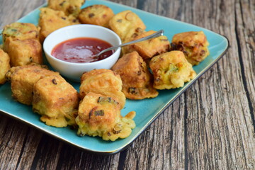 A traditional fried food from Indonesia made from tofu served with chili sauce