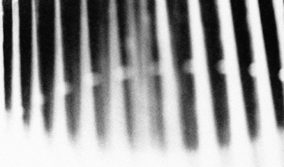 Film black old texture with grainy noise. Distressed retro photo effect. Old movie filter overlay. Grunge gritty texture with dust, scratches and subtle spots.