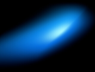 Glowing blue blur gradient oval light spot on black background