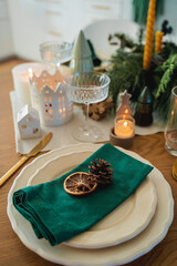 Festive table setting. Home Christmas with decor. New Year.