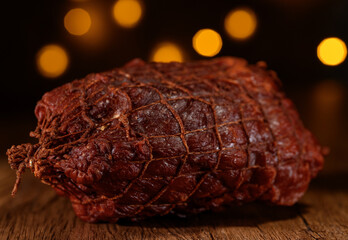 Close-up of a cherry-colored piece of smoked country ham