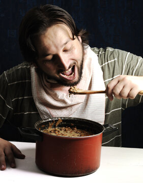 Man eating fanny at home relaxing resting. High