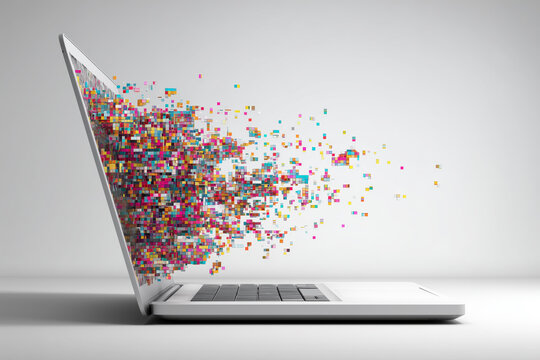 Laptop explodes with colorful pixels flying out in all directions