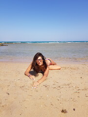Fototapeta premium young woman on the beach