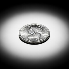 Vintage Canadian Dollar Coin Under Dramatic Lighting