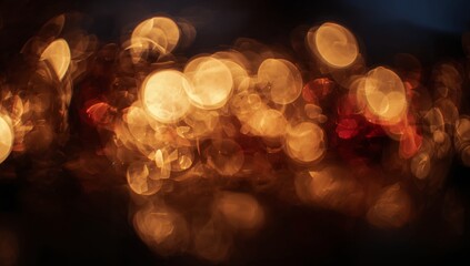 Glowing cluster of warm bokeh orbs shimmering at nighttime city street, showing lens halos