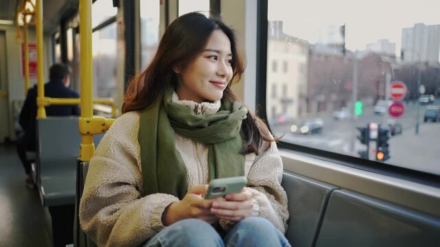 Young asian woman traveling with tram during winter season - City, transportation and urban lifestyle concept - Models by AI generative