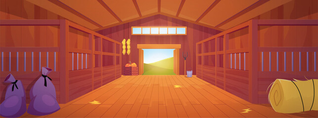 An empty wooden barn or shed with an open door, pens, sacks, straw, and tools. © sabelskaya