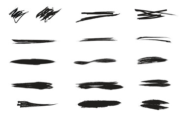 Collection of black brush strokes and marks on white background