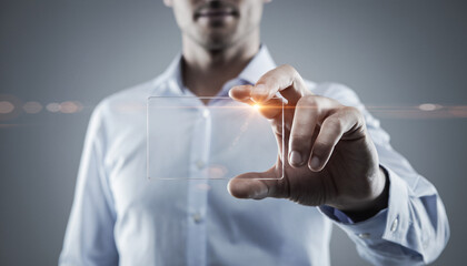 Man in white shirt interacting with a glowing digital interface.