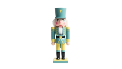 Isolated decorative nutcracker figurine with traditional blue and yellow uniform suit