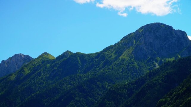 aerial mountain timelapse in Val di Scalve, Orobie Alps. Dramatic clouds moving over rocky peaks in Italian nature landscape