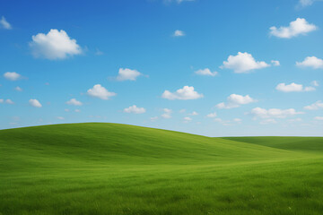 Green rolling hills under blue sky with scattered white clouds