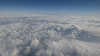 Cloud Sea and Blue Sky Seen from an Airplane on the Way to Jeju Island in Winter