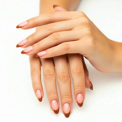 Fototapeta premium elegant female hands with medium almond nude nails and brown french tips resting on white background, minimalist beauty nail art concept. 