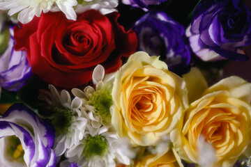 Vibrant floral bouquet with roses and chrysanthemum.