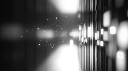 Abstract digital rendering showing bright glowing particles flowing through illuminated vertical lines. Creating a sense of connectivity. Speed. And advanced technology in a monochromatic environment
