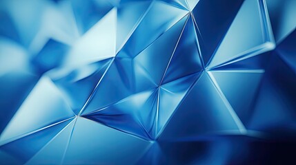 Blue abstract textured background features a pattern of polygonal geometric shapes and reflective surfaces, creating a modern illustration with varying shades and sharp lines