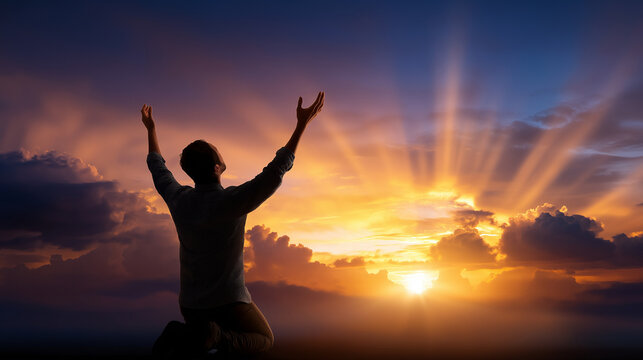 Silhouette of faceless person kneeling in prayer position with arms raised toward illuminated sky, spiritual devotion moment, defocused divine light rays, contemplative worship sce