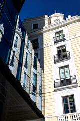 The Colossal and modern Colon Tower next to old building in Madrid City