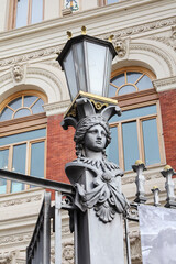 Iron fence with Corinthian columns of The Ministry of Agriculture building in Madrid city