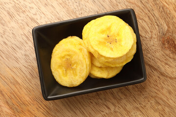 Banana chips is a deep-fried or dried,  crispy slice of banana. 