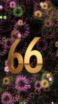 Gold number 66 with fireworks in the background. Festive scene for birthday or anniversary party