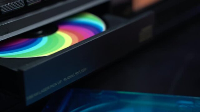 Compact Disc With Rainbow Sticker, Interesting and Starting Playback in CD Audio Player