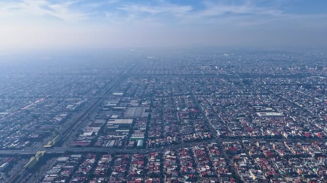Hyperlapse shot from above the urban landscape of Ecatepec, Mexico