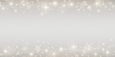 Christmas sparkle with gold confetti and star light. Bright festive background.