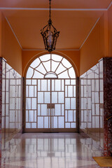 Entryway of an old residential building near Corso Sempione, Milan, Italy