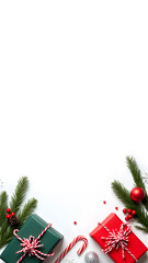 Red, green gift boxes and other Christmas decorations on white backdrop