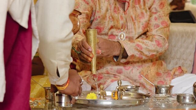 The ceremony includes customs like Kanyadaan, Mangal Phera, and Sindoor Daan, symbolizing spiritual union and cultural heritage