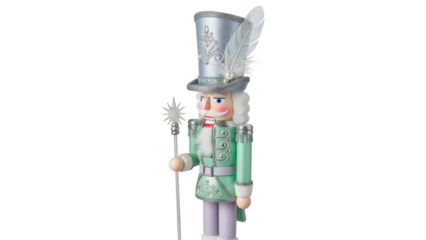 Isolated whimsical nutcracker doll figure with decorative feather, hat, and a fancy staff