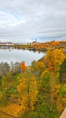 Obraz premium Sunset over the modern city part and architecture of Liljeholmen by Lake Mälaren in Stockholm, Sweden
