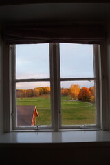 Fototapeta premium Stunning autumn vibes with orange and yellow trees in the Swedish countryside around Sörmland