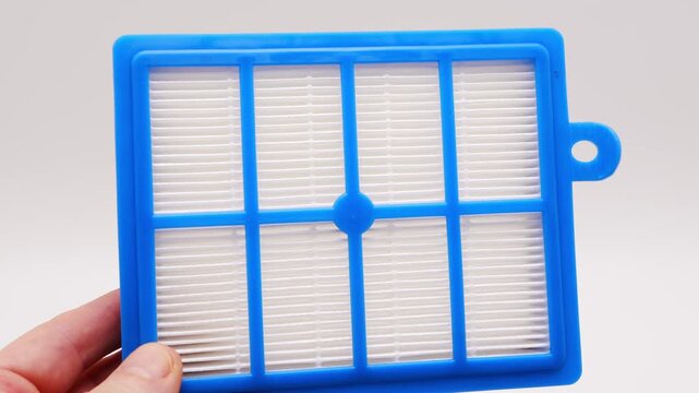 Cleaning and maintaining a vacuum cleaner HEPA filter