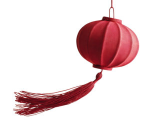 Festive red Chinese lantern with decorative tassel hanging in dark. beautiful, traditional Asian celebration decor element symbolizing joy and good fortune