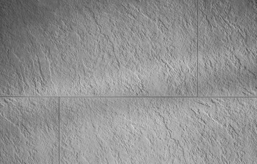  Światłocienie na nier&oacute;wnej kamiennej ścianie