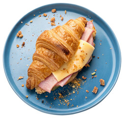 ham and cheese croissant on blue plate